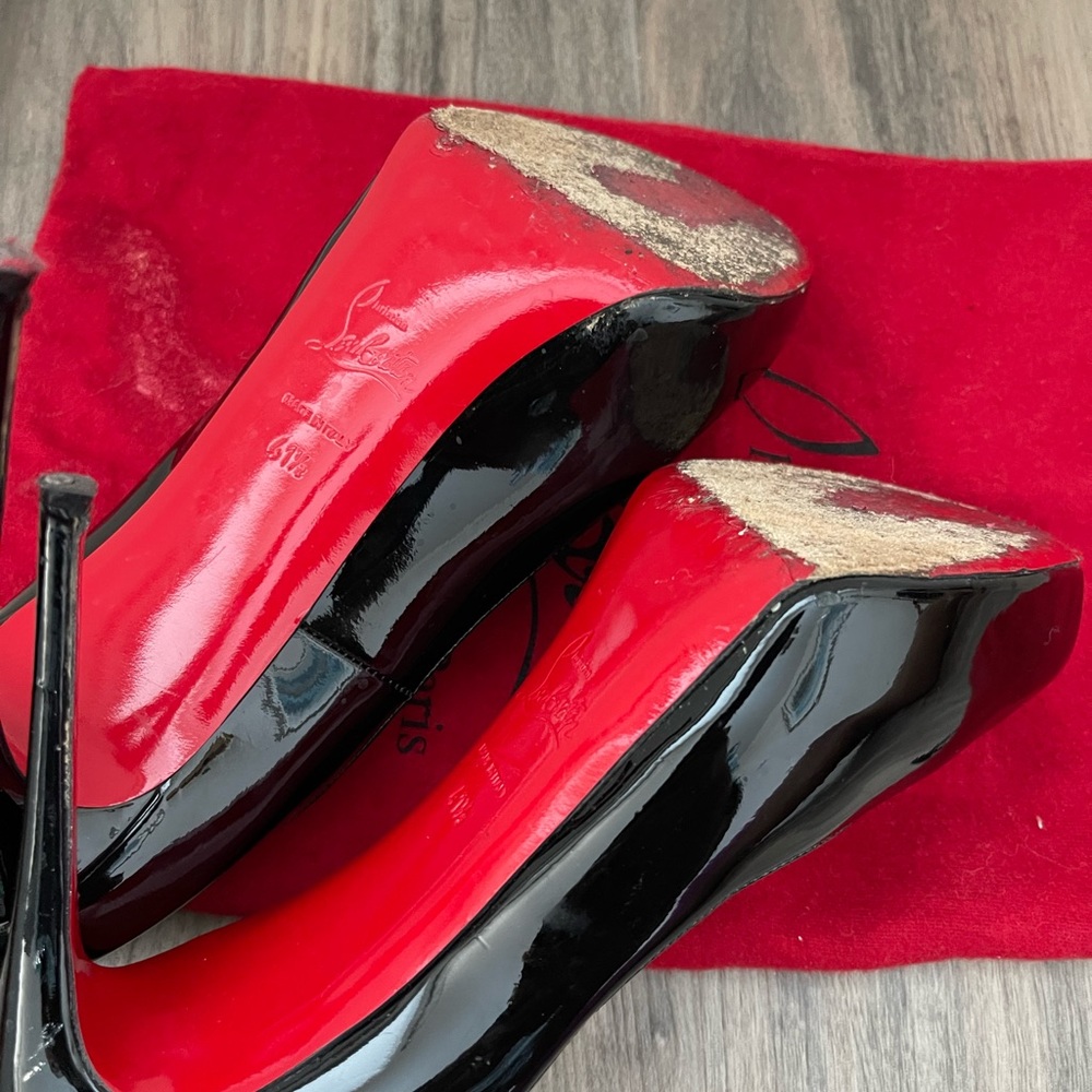 Christian Louboutin heels, some wear on the heels super cute and stylish